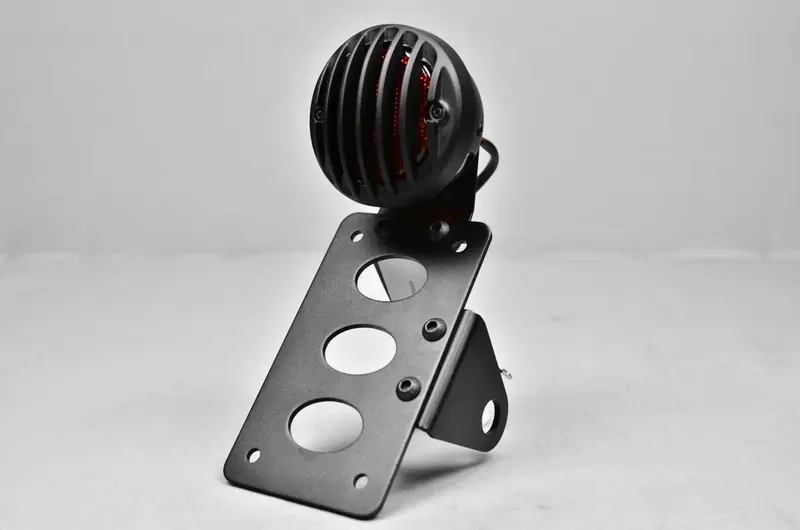 Support de plaque latéral avec feux